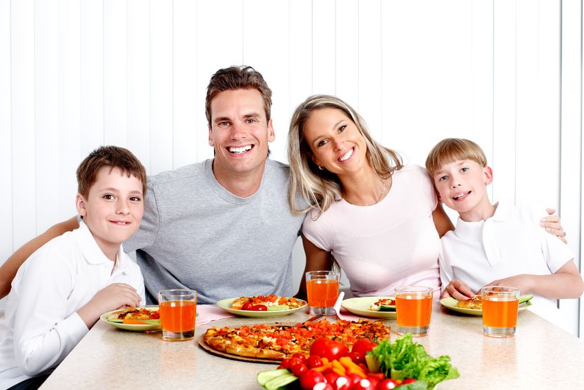 happy family eating dinner