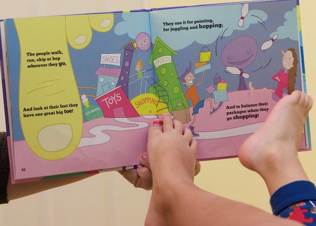 They also like the page about the giant toes, which they frequently want to point at with their own giant toes.