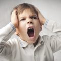 child throwing a temper tantrum