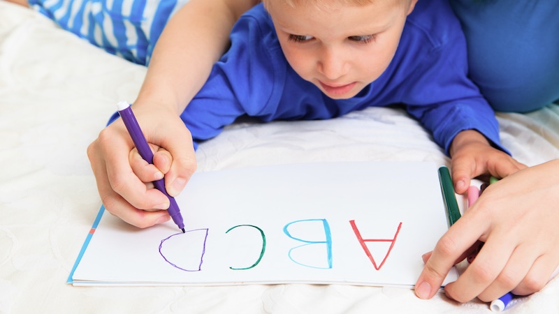 parent and child reading letters